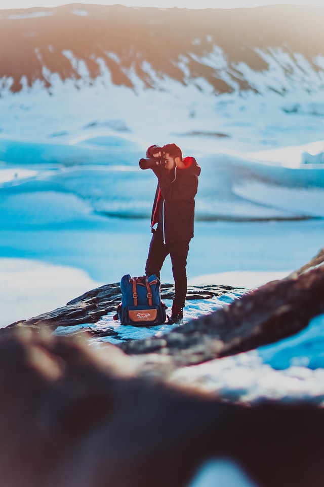 Photographer with backpack